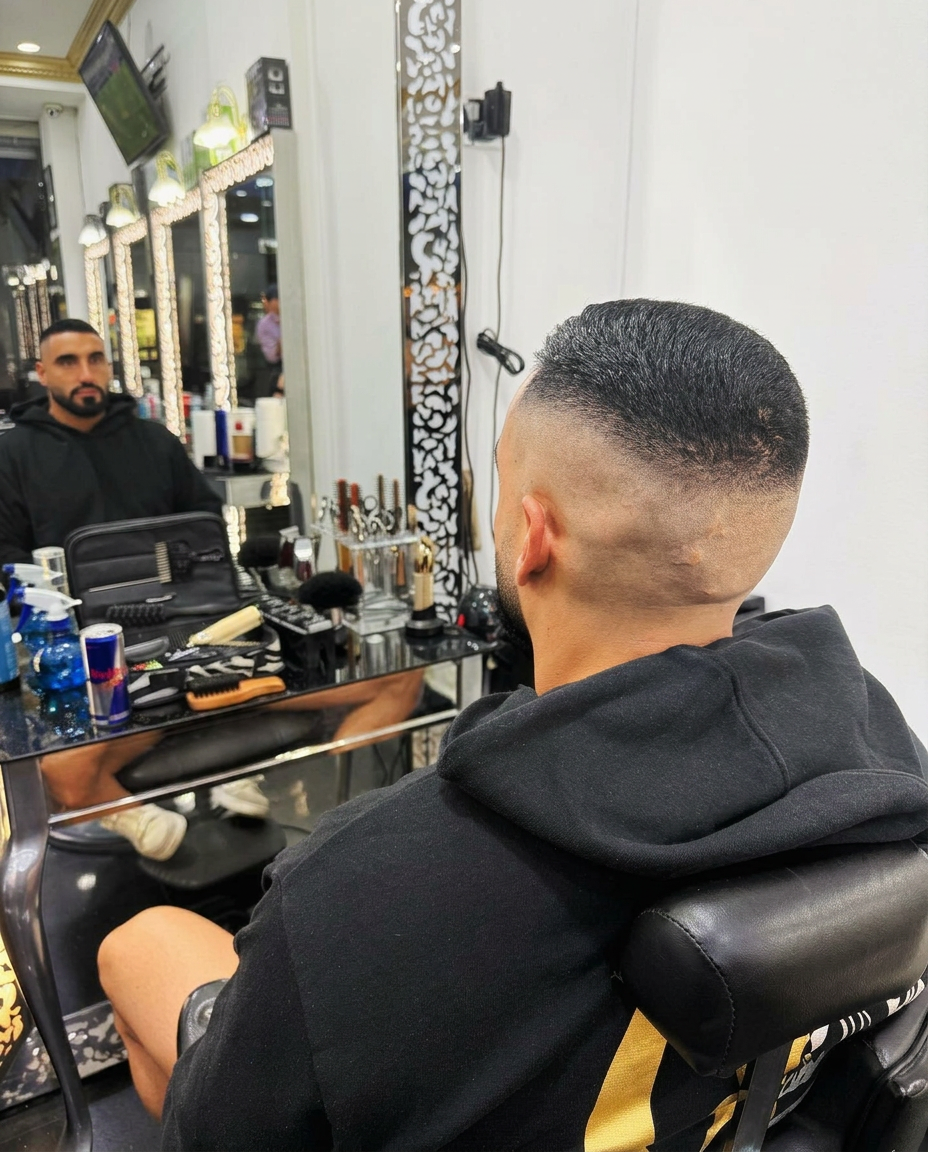 High skin fade from the back with sharp blend and crisp finish
